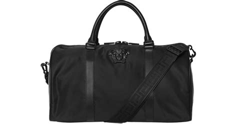 versace nylon duffle bag.